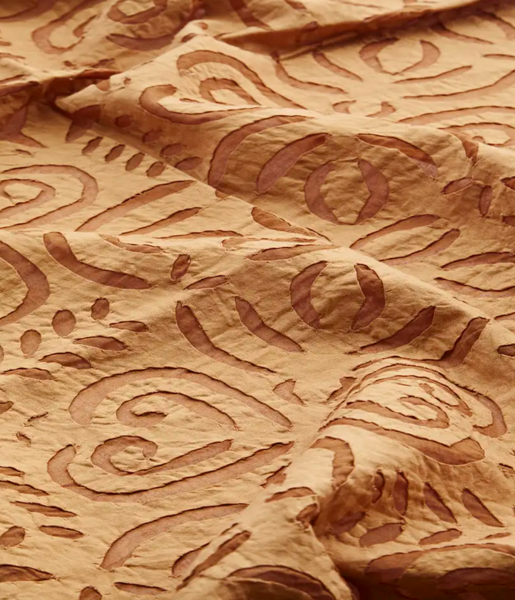 Handmade cutwork throw