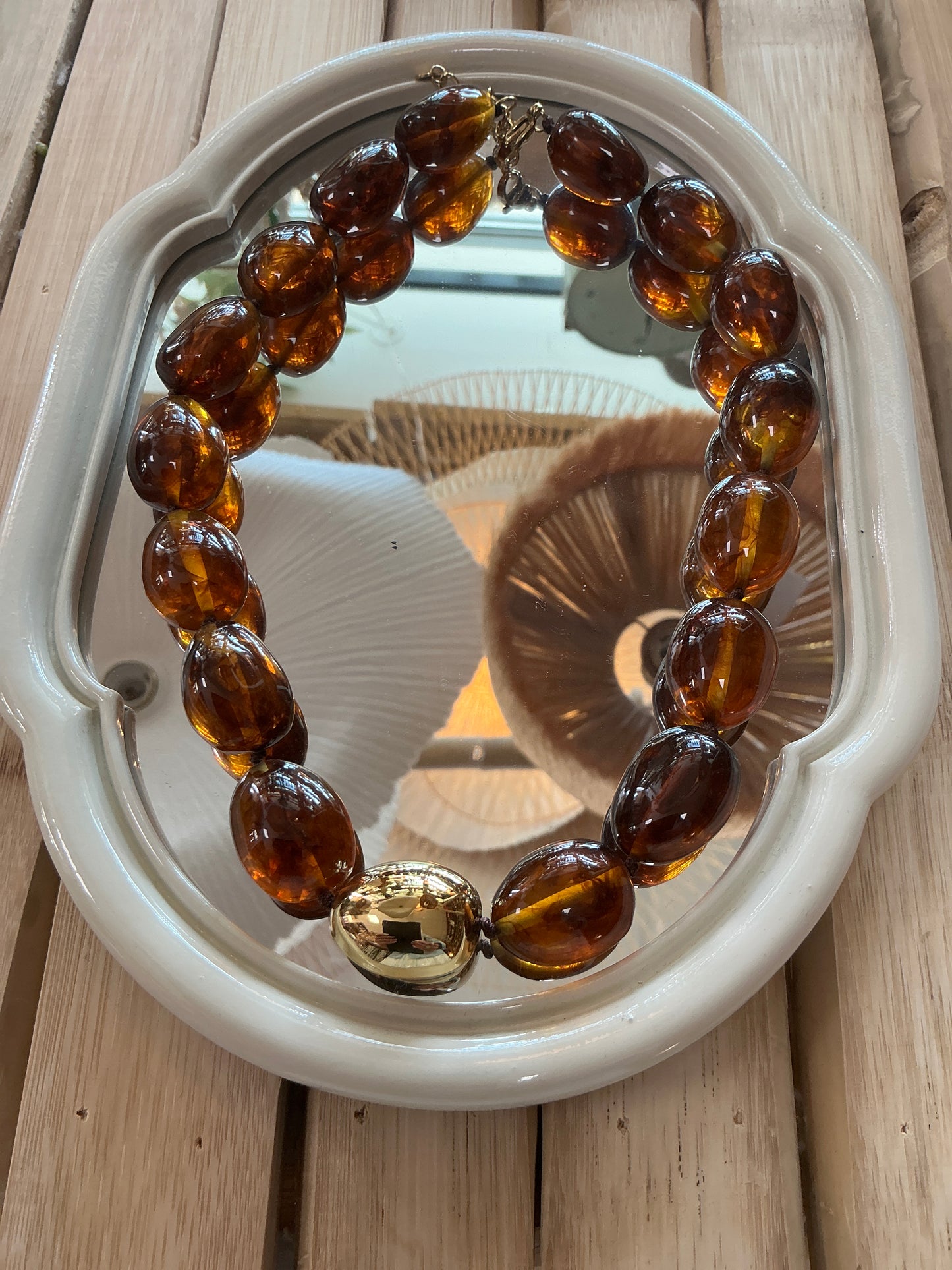 Collier marron perle doré