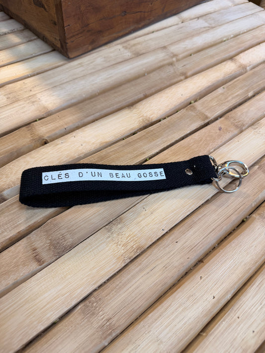 Sangle noir / dymo blanc - Clès d'un beau gosse